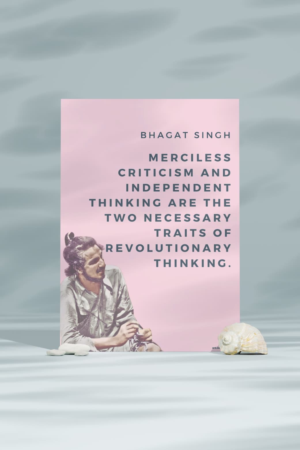 A poster featuring a portrait of Bhagat Singh, an Indian revolutionary. The quote "Merciless criticism and independent thinking are the two necessary traits of revolutionary thinking" is written in bold letters below his image.