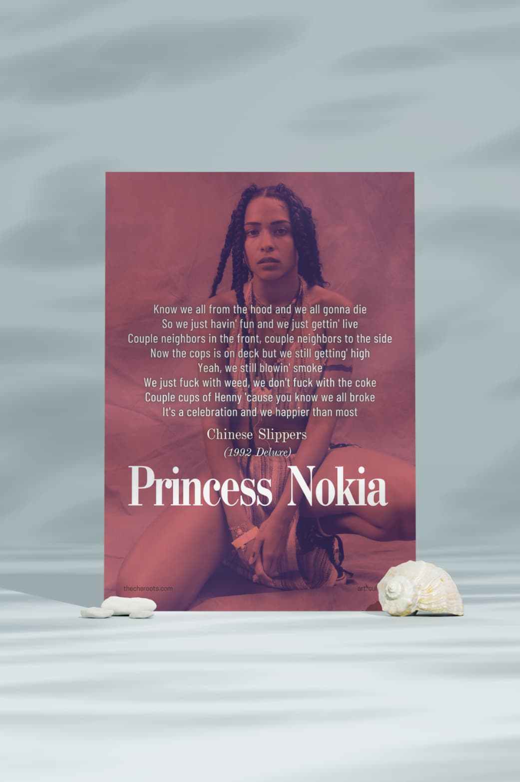 A poster featuring a black and white portrait of Princess Nokia, a rapper and singer-songwriter. The text "Know we all from the hood and we all gonna die" and other lyrics from her song "Chinese Slippers" are included. The poster is set against a blue background.